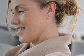 A smiling woman signifying a happy WorldFirst customer