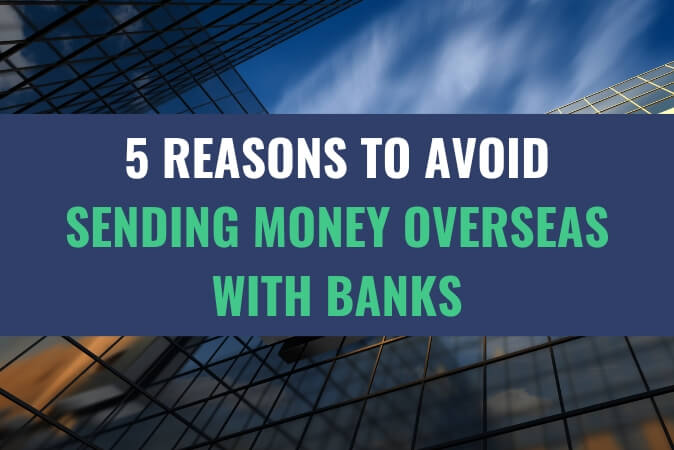 An image of the sky amidst tall skyscrapers with the title - 5 Reasons To Avoid Sending Money Overseas With Banks