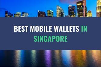 An image of tall buildings in the night by the ocean with the title - Best Mobile Wallets in Singapore