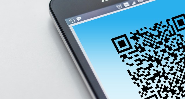 A smartphone application with a QR code loaded on it
