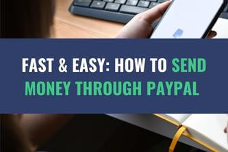 An image of a person using an iPhone at a desk with a computer with the title - Fast and Easy: How to Send Money through PayPal