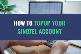 An image of a person working on a calculator on a desk with the title - How to Top Up Your Singtel Account