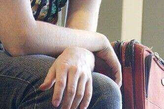 A person waits at the airport while traveling for work