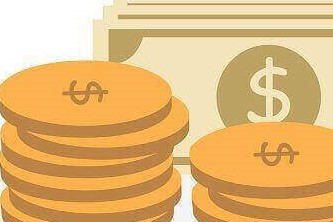 Two stacks of coins with curreny notes in the background