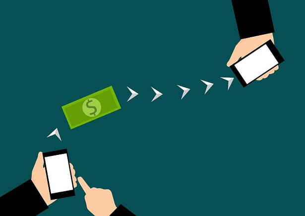 A graphic showing money flowing from one phone to another, thereby depicting mobile money transfer