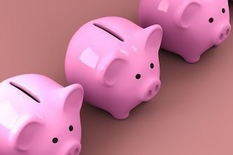 A row of several piggy banks next to each other