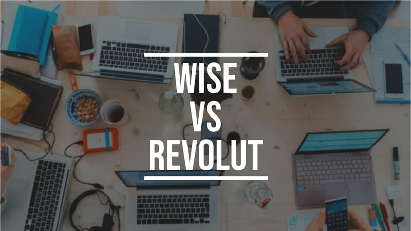 An image of laptops and phones on a table with the title Wise ve Revolut printed on the forefront